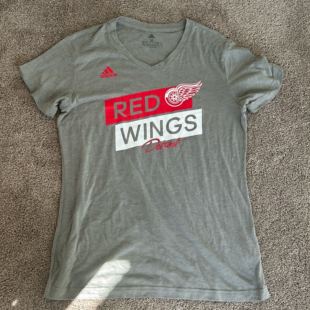 Detroit Red Wings Adidas short sleeve top.